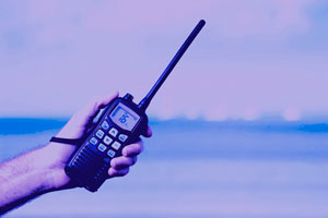 Man holding a two way radio